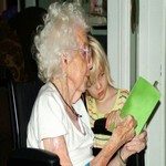 801960_reading_with_grandmother_in_wheelchair